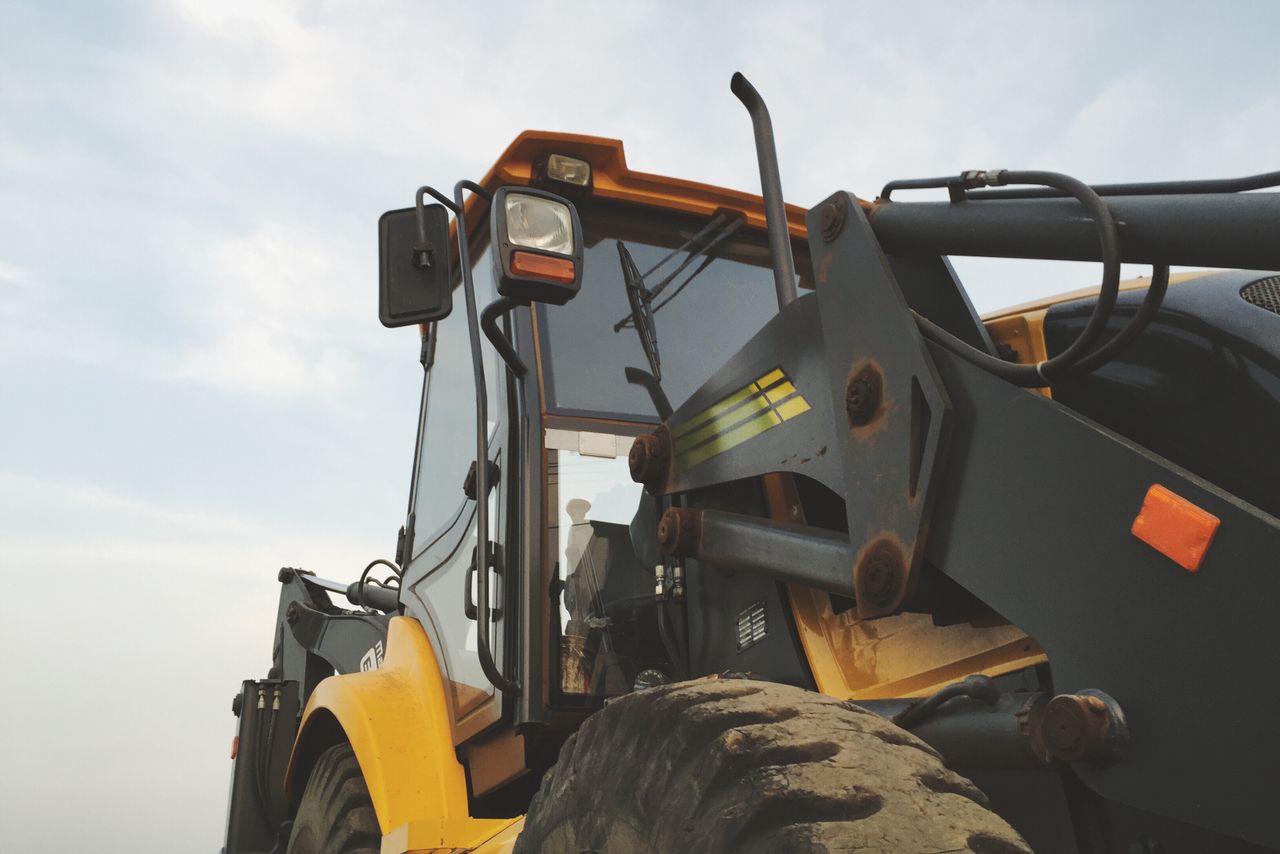 A tracked excavator working on a construction site