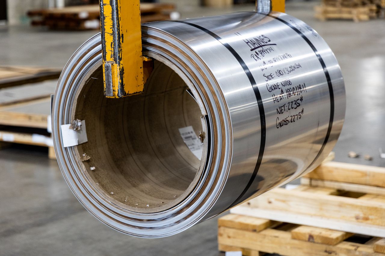 Steel coils and metal stock stored in an industrial warehouse
