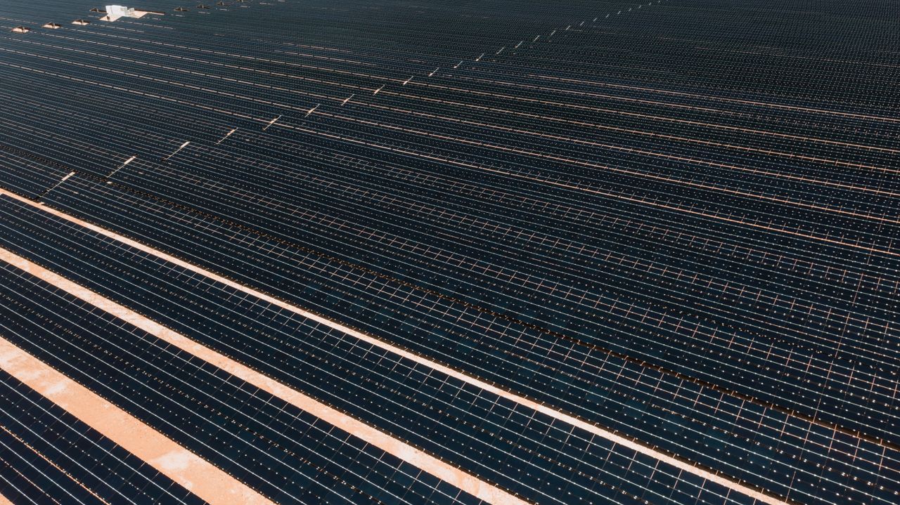 Solar panels beside a battery storage unit